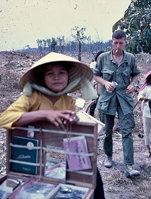 doc bruce w girl selling albums